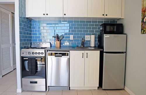 Madeira Beach Condo | OPEN nts SALE : 1bd 1ba Gulf front : Kitchen, Pool, and John's Pass access!