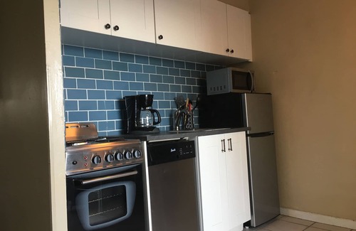 Madeira Beach Condo | OPEN nts SALE : 1bd 1ba Gulf front : Kitchen, Pool, and John's Pass access!