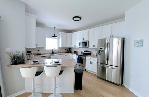 St. Charles House | Opulent 3-Bedroom Home w/Garage- Monthly Stays Only