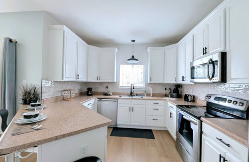 St. Charles House | Opulent 3-Bedroom Home w/Garage- Monthly Stays Only
