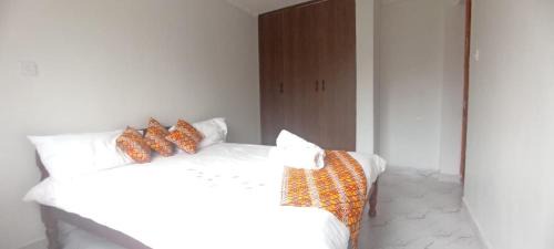 Thika Apartment | Orange kitenge Thika sunrise