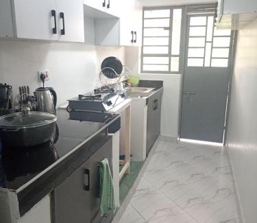 Thika Apartment | Orange kitenge Thika sunrise