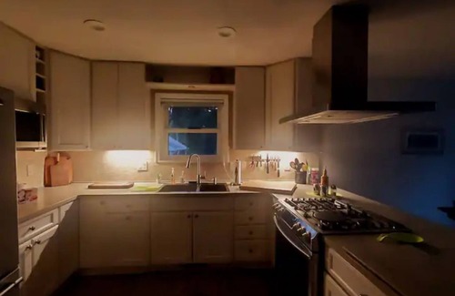 Greenbush Cottage | Oscoda Cedar Lake updated waterfront beach cottage