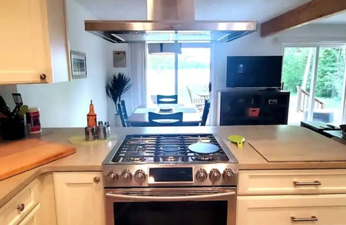Greenbush Cottage | Oscoda Cedar Lake updated waterfront beach cottage