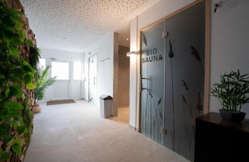 Gronenberg House | Ostseecamp Lübecker Bucht Ferienhaus "Beachhouse" mit kostenlosen Saunazugang