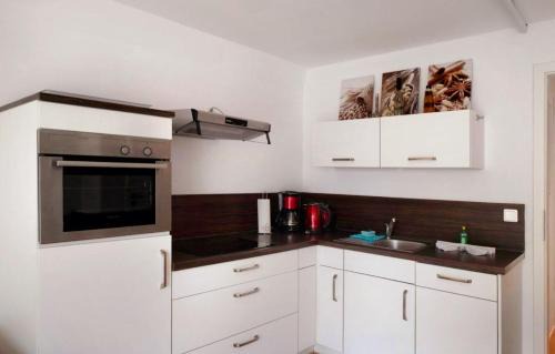 Warnemuende Apartment | Ostseeoase mit Strandkorb am Meer