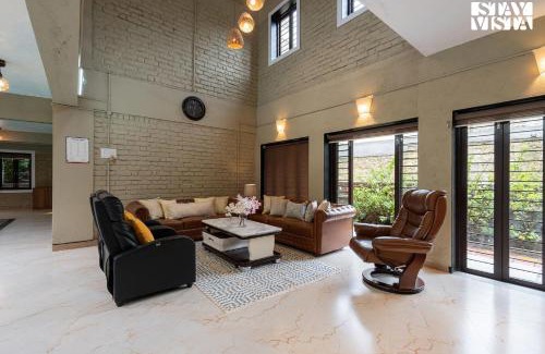 Panchgani Villa | Otonia by StayVista with Indoor swimming pool, Modern interiors & a mix of indoor & outdoor games