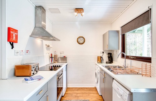 Crianlarich Ski Chalet | Otter with mountain view and enclosed decking