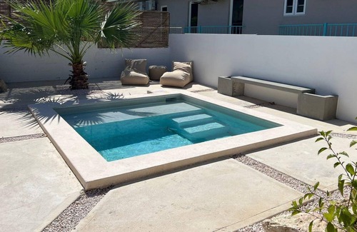 Jan Thiel Apartment | Our new two-bedroom apartment, located in a tropical garden, has a harmonious indoor-outdoor design, modern amenities, two comfortable bedrooms and a Plunge Pool in the shared garden, all for €95.00 per night