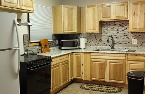 Crystal Lake Cabin | Our Property offers a relaxing getaway with a hot tub and massage chair!