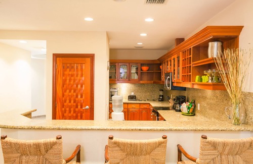 Lawson Rock Condo | Out our door onto the sand and into the water, luxury condo and Large Patio in Lawson