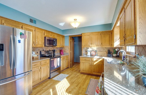 Overland Park Cottage | Overland Park Family Home w/Game Room & Backyard!