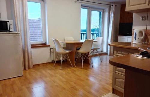 Faszcze Apartment | Owocowe Wakacje - Apartament nad jeziorem