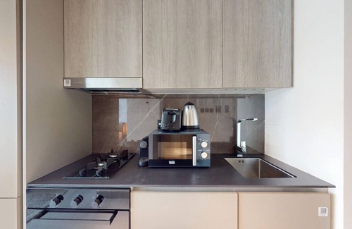 Jumeirah Village Apartment | Oxford Boulevard - BohoChic Studio with Pool View