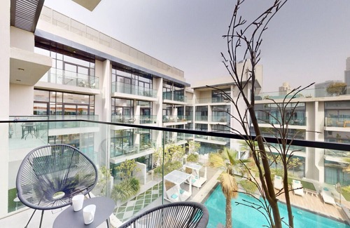 Jumeirah Village Apartment | Oxford Boulevard - BohoChic Studio with Pool View