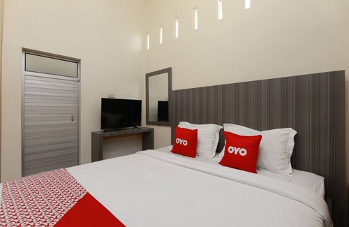 Ambarita Hotel | OYO 1694 Pariban Homestay