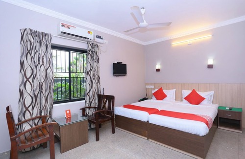 Kakkanad Hotel | OYO 23116 Gino Tourist Home