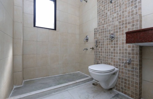 DLF City Hotel | OYO 24323 Lakshmi Residency