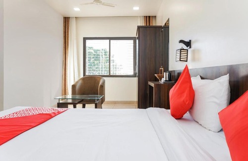 Parner Hotel | OYO 27051 Karishma Palace