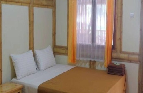 Sukabumi Hotel | OYO 3303 Penginapan Putri Asih Sawarna