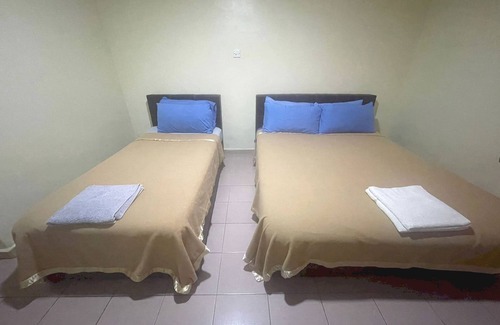 Kampung Hulu Caluk Hotel | OYO 90914 Hotel Mei Wah