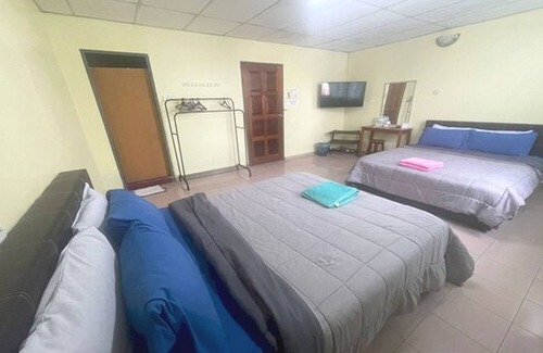 Kampung Hulu Caluk Hotel | OYO 90914 Hotel Mei Wah