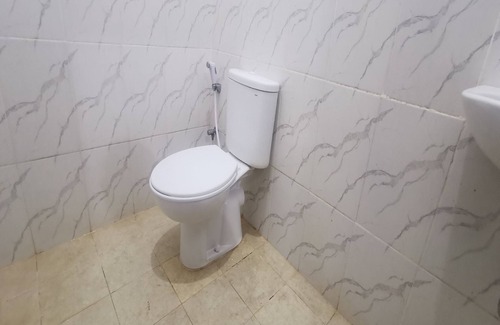 Samarinda Hotel | OYO 94163 Vida Homestay