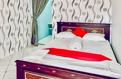 Samarinda Hotel | OYO 94163 Vida Homestay