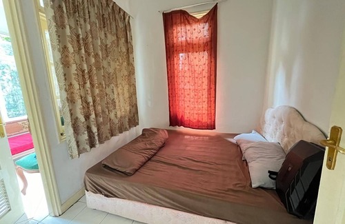 Cipanas Hotel | OYO 94710 Puncak Resort Guest House