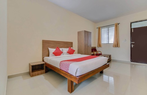 Krishnarajapura Hotel | OYO Flagship 29620 New Champion Residency