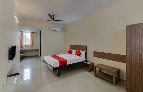Krishnarajapura Hotel | OYO Flagship 29620 New Champion Residency