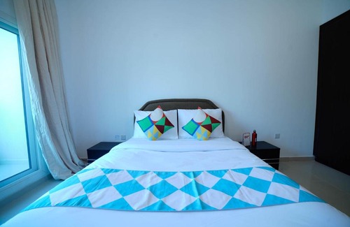 Dubai Investment Park Apartment | OYO Home 483 1BHK Tamcon DIP