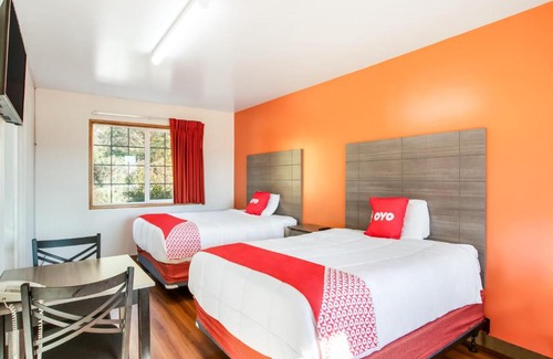 Carrolls Hotel | OYO Hotel Kalama