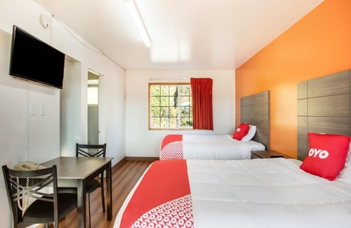 Carrolls Hotel | OYO Hotel Kalama