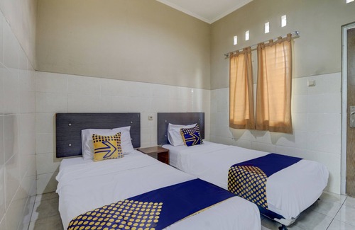 Muncar Hotel | OYO Life 90159 Puri Asoka Guest House