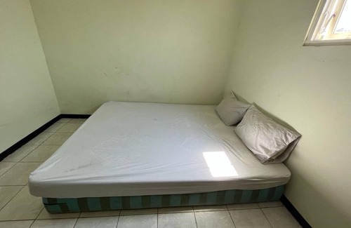 Dinoyo Hotel | OYO Life 92982 Kost Berkah Ibu