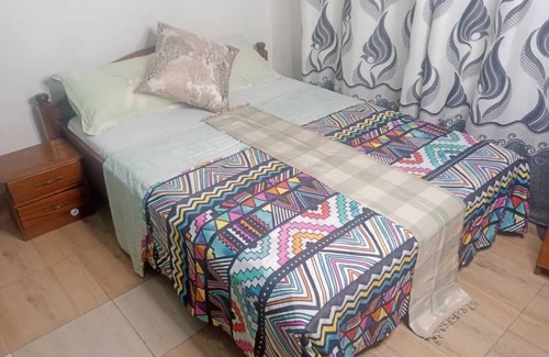Kigali House | PagersHome Suites - RUSTIC