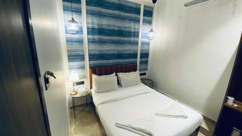 Wellington Pier Hotel | Palm Breeze Hotel - Colaba