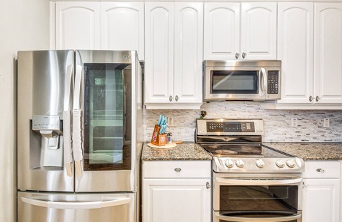 Palm Coast House | Palm Coast Townhome w/Pool Access ~ 4 Mi to Beach