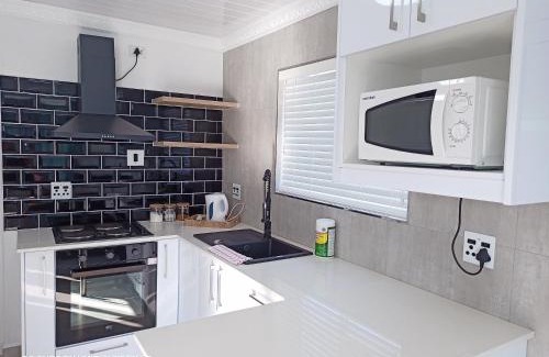 Goodwood Apartment | Palm Tree