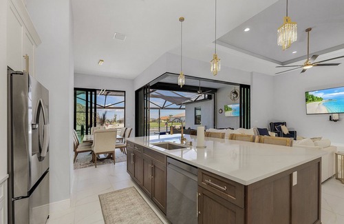 Burnt Store House | Paradise Tiki: Gulf Access, Tiki Bar, Pool & Spa! Spacious 5 bedroom home!