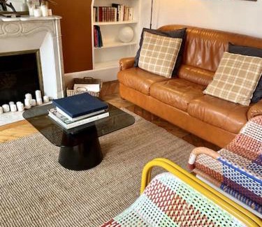 Quartier de Rochechouart Apartment | ParisHome! Double Balcony, Art & Designer Touches
