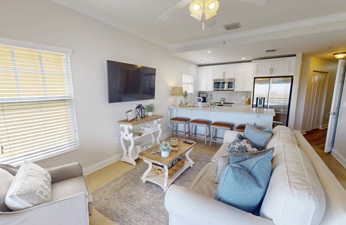Treasure Island Condo | Partial Gulf View! Top Floor/Corner Unit. Watch dolphins from balcony. Great Views & Great Location!