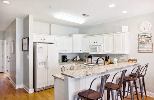 Folly Beach Condo | Partial ocean view & 'A Stone's Throw' to shops & restaurants