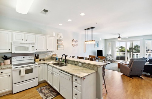 Folly Beach Condo | Partial ocean view & 'A Stone's Throw' to shops & restaurants