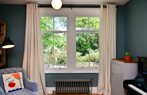 Radyr and Morganstown House | Pass the Keys | 4-Bedroom Retreat in Radyr w/Lush Gardens & Parking