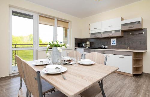 Wrzosowo Apartment | Peaceful Apartment Wrzosowo Bay with Parking by Noclegi Renters