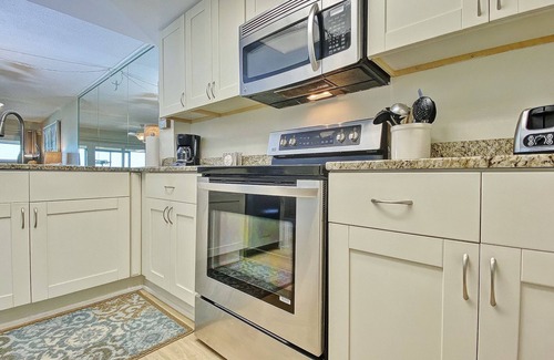 Madeira Beach Condo | Peaceful beachfront escape w/private balcony, heated pool, pool spa, BBQ grills