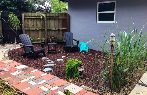 Edgewood House | Peaceful & charming dog-friendly retreat with fire pit, yard, patio, AC, & W/D