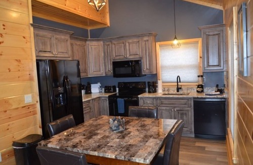 Tellico Plains Cabin | Peaceful family cabin near fishing with over 100 acres of mountain and field trails to explore! by RedAwning